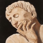 Visage en relief façon "haut relief" en pierre